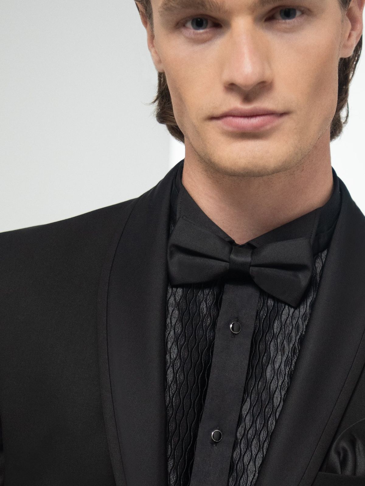 Jacquard bib, black, worn